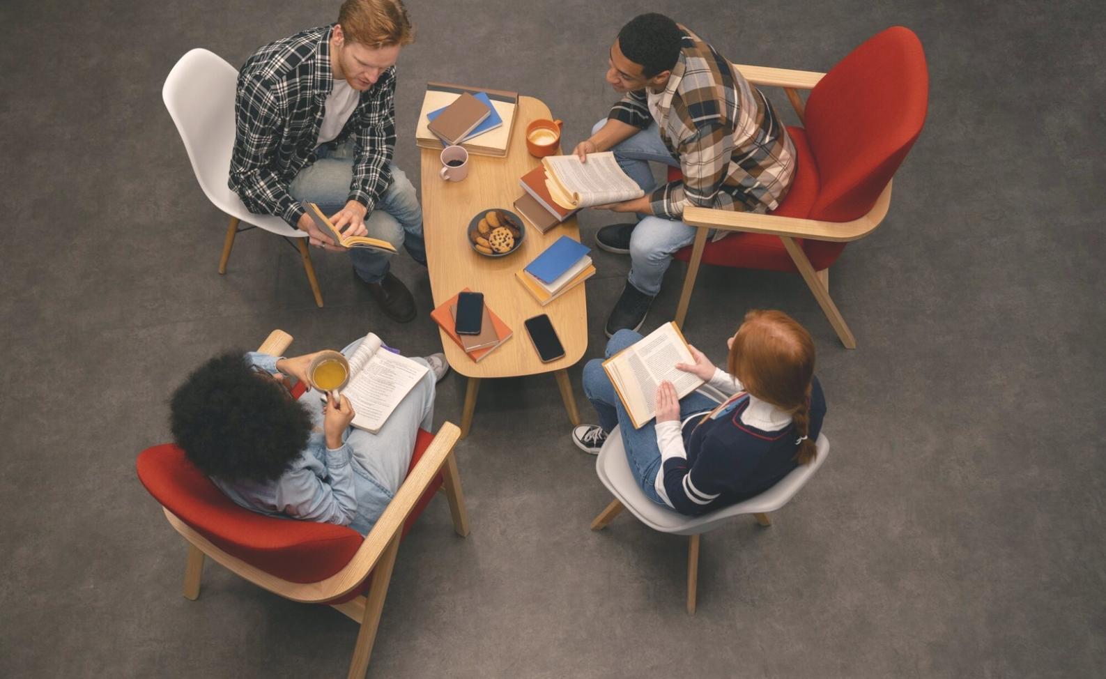 Students working on typography projects with modern design tools